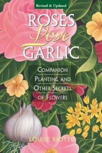 cover of the book Roses Love Garlic: Companion Planting and Other Secrets of Flowers