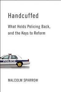 cover of the book Handcuffed: What Holds Policing Back, and the Keys to Reform