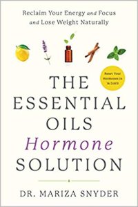 cover of the book The Essential Oil Hormone Solution: Reset Your Hormones in 14 Days with the Power of Essential Oils