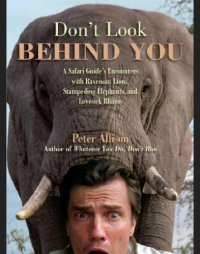 cover of the book Don't look behind you: a safari guide's encounters with ravenous lions, stampeding elephants, and lovesick rhinos