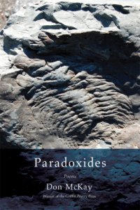 cover of the book Paradoxides: poems