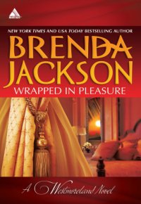 cover of the book Wrapped in Pleasure: Delaney's Desert Sheikh; Seduced by a Stranger