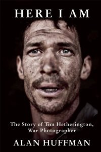 cover of the book Here i am : the story of tim hetherington, war photographer